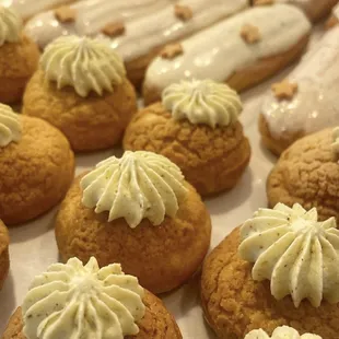 a tray of cookies with frosting
