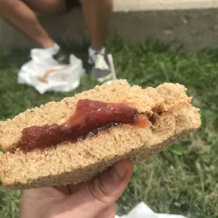 Classic pb and j sandwich on honey whole wheat bread