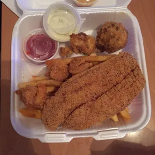 The Fish and Shrimp basket with an order of boudin balls. Very good you won&apos;t be disappointed