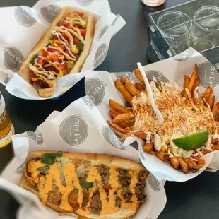 two baskets of food and a glass of beer