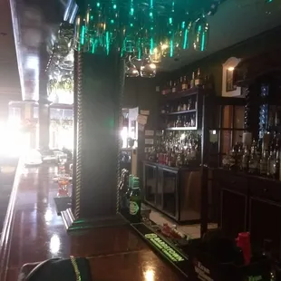 Down the bar.