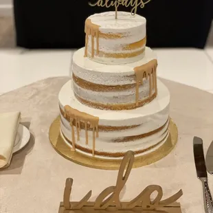 3 tier naked wedding cake with drizzle