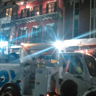 The start of every parade has a Cox truck, an Energy truck and police.