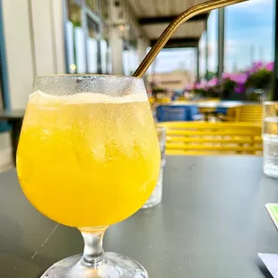 a drink in a glass with a straw