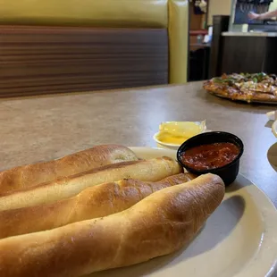 a plate of breadsticks