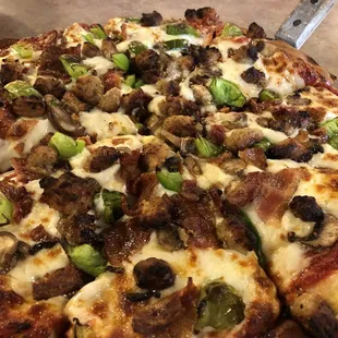 The dough is nice and fluffy on the inside and crisp on the outside the topping is awesomely loaded soooo good!