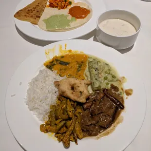 Mysore dal, avial, eggplant kulambu, tindola, puri, paratha, medu vada, coconut chutney, onion chutney, gajar marcha, papad, payassam.