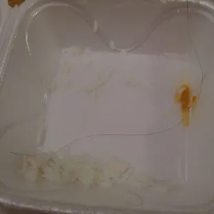 a plastic container with food in it