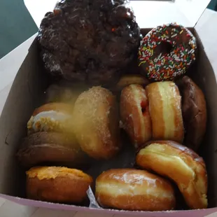 a variety of donuts in a box