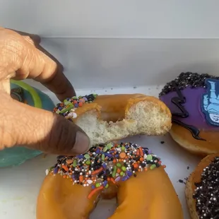 Orange colored glaze with sprinkles