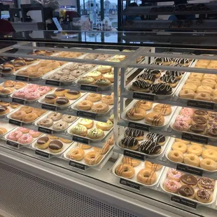 a display of krispy kreme doughnuts