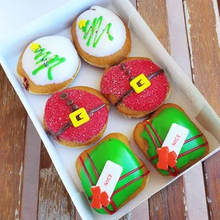 Festive Tree (red velvet cake batter filled), Santa Belly (chocolate kreme filled) and Present (sugar cookie kreme filled)