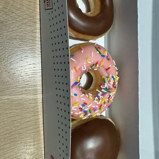 three donuts in a box