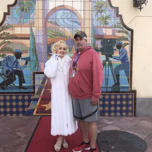 a man and a woman posing for a picture