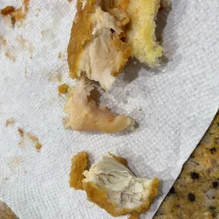 That is raw chicken meat in the sandwich i Ordered for my child.