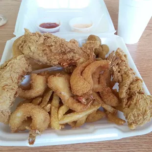 6 shrimp 3 tenders okra roll and fries.