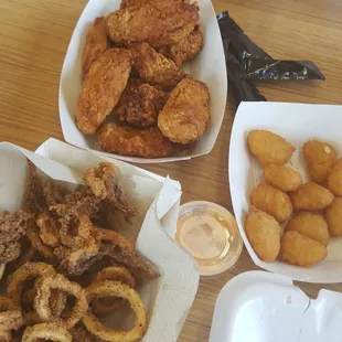 Calamari, corn fritters, and hot wings