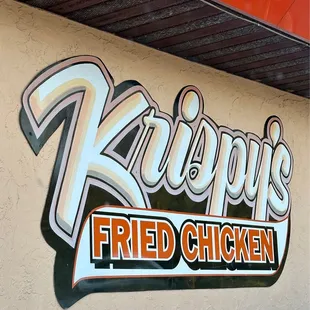 a sign for krispy&apos;s fried chicken
