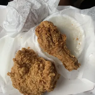 2 piece fried chicken dinner with 2 sides and a fritter!
