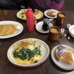 a table full of breakfast foods