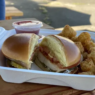 Chicken Sandwich and Tater Tots with Ketchup and Cajun Ranch