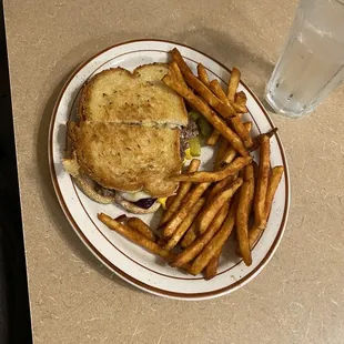 a sandwich and fries on a plate
