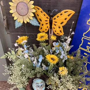 The pretty flowers in front.