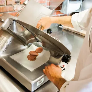 a chef making burgers