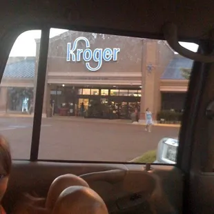 a woman sitting in a car