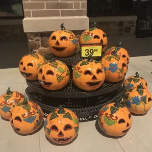 a display of pumpkin heads