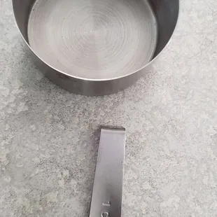 Measuring cup with broken handle. Thought metal would mean it its heavy duty... guess not. Broke measuring sugar. -_-