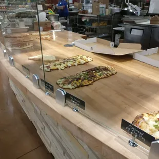 Pizza and flat bread counter. Live pizzas right out from the oven were great.