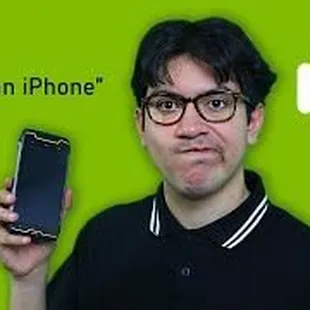 a man holding an iphone