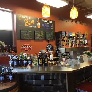 They have a craft beer bar -- $3.50 to sit and have a pint!!! ($2.50 for the pour, $1 for the glass -- which you get to select and KEEP!)