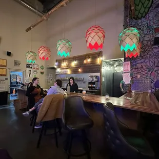 people sitting at the bar