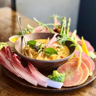 a bowl of soup on a plate