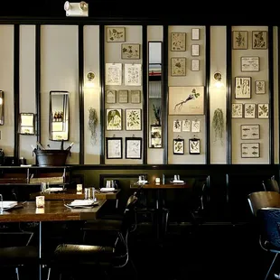 an empty restaurant with tables and chairs