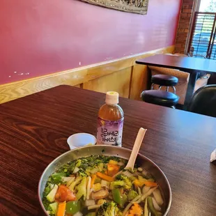 a bowl of soup on a table