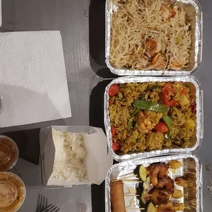 andaman salmon, pad thai, pineapple fried rice, shrimp satay with a stray vegetable spring roll, beef satay. All excellent (and half-eaten!)