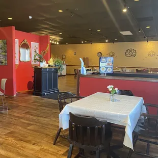 a restaurant with tables and chairs