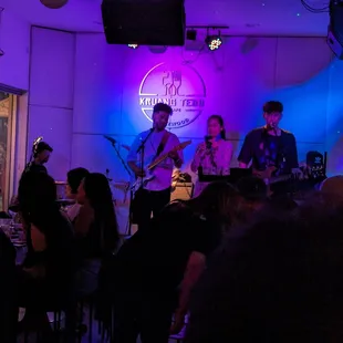 a band performing in a restaurant