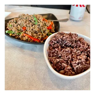 a bowl of rice and a plate of meat