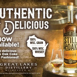 two bottles of whiskey and a glass