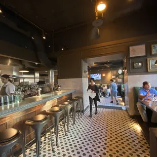 people sitting at the bar