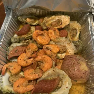 Added Steamed Garlic Oysters, Shrimp,  Sausage