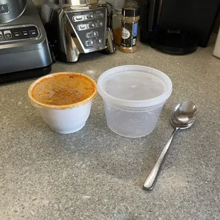 New container vs old soup serving for pick up.