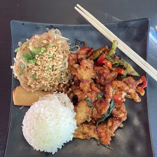 Crispy garlic chicken lunch plate with rice, phad thai and spring roll - this is A LOT of food for a great price!!