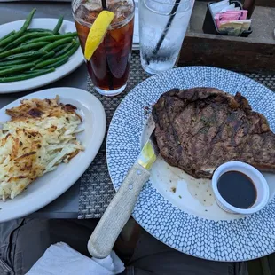 22 Ounce Bone-In Ribeye with potato hash and green beans