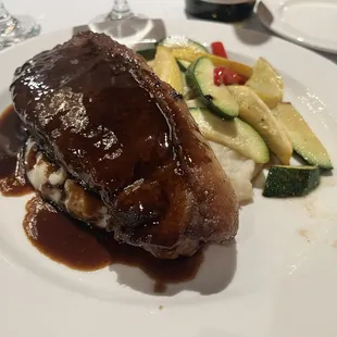 New York steak with whipped mashed potatoes and grilled seasonal vegetables