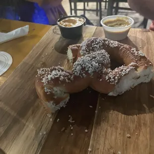 German pretzel. Crisp outside and soft inside. Great flavor and yummy beer cheese or mustard to dip it in.